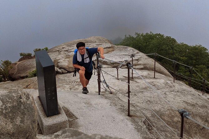 Bukhansan National Park- The Summit Course - Borrowed poles and crampons at the one-third point