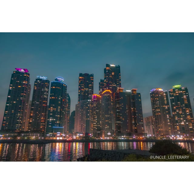 Busan: Haeundae 100-Minute Walking Tour - The walk toward Dongbaek Island
