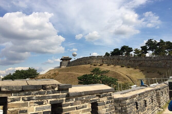 Day Tour of Suwon Hwaseong Fortress Starfield Waujeongsa Temple - Walking the 5.74-kilometer walls of Hwaseong Fortress
