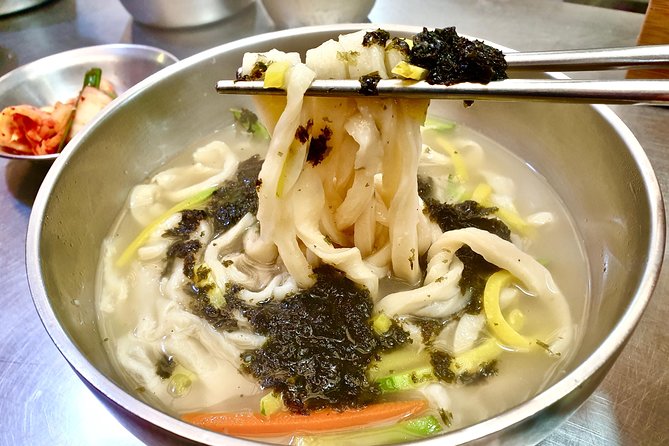 Downtown Seoul Guided Food & Market Tour with 8+ Local Tastings - Mandu and tteokbokki bring two different textures