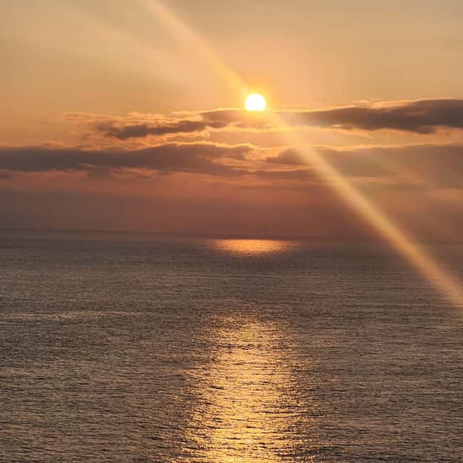 Jeju Island: Sunrise Guided Tour with Hotel Pickup - Weather, clothing, and timing