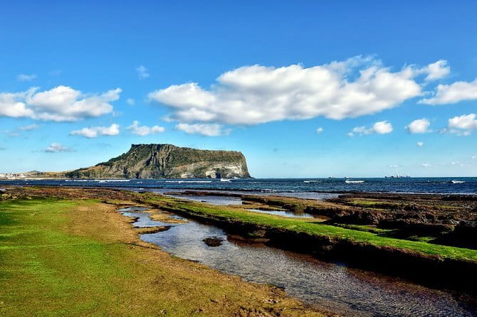 Jeju Unesco Eest course Package Private Van Guided Tour - Seongsan Ilchulbong: the day’s volcanic centerpiece