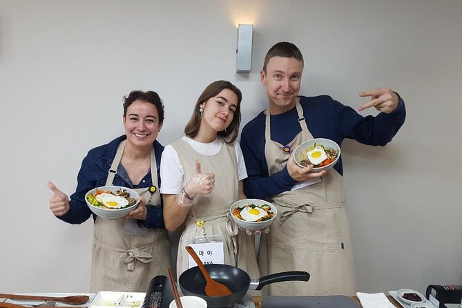 Korean cooking class in Haeundae, Busan - The apron, welcome drink, and sauce lesson