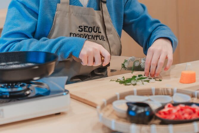Korean Cooking Class with Grocery Shopping at Seoul Local Market - Cooking three Korean home-style dishes