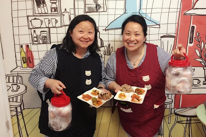 Korean Kimchi Making Day Experience with a Local Market Tour - Eating kimchi with pork, tofu, and makgeolli