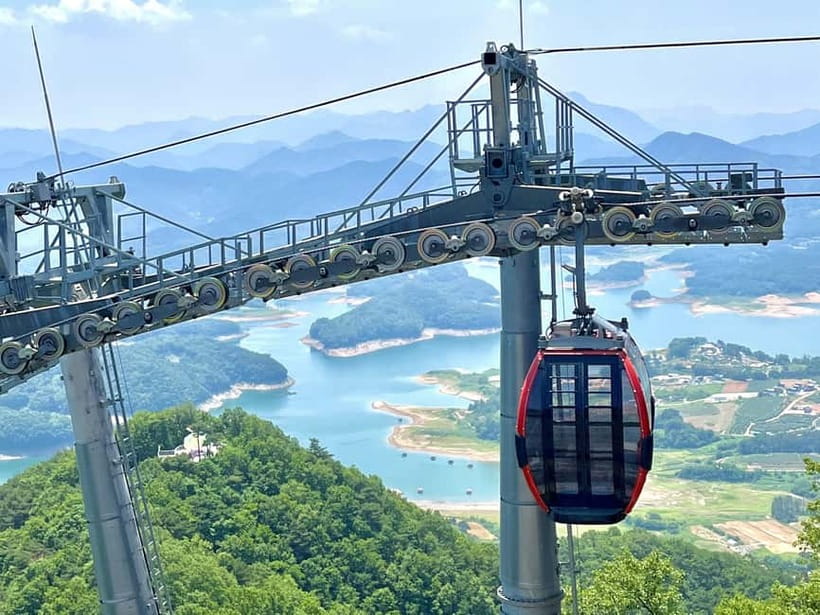 Seoul: Chungju Cruise, Cable Car & Cave Kayak Adventure Tour - Chungju Lake cruise, cliffs and wooded islands