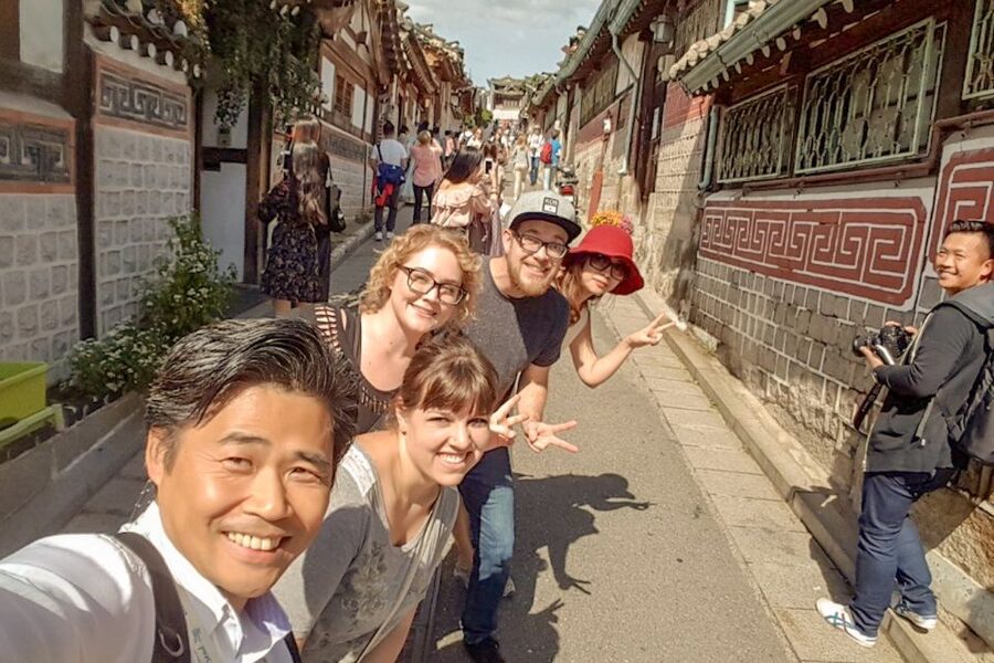 Seoul: Gyeongbok Palace and Bukchon Hanok Walking Tour - Bukchon Hanok Village means lanes, houses, and hills