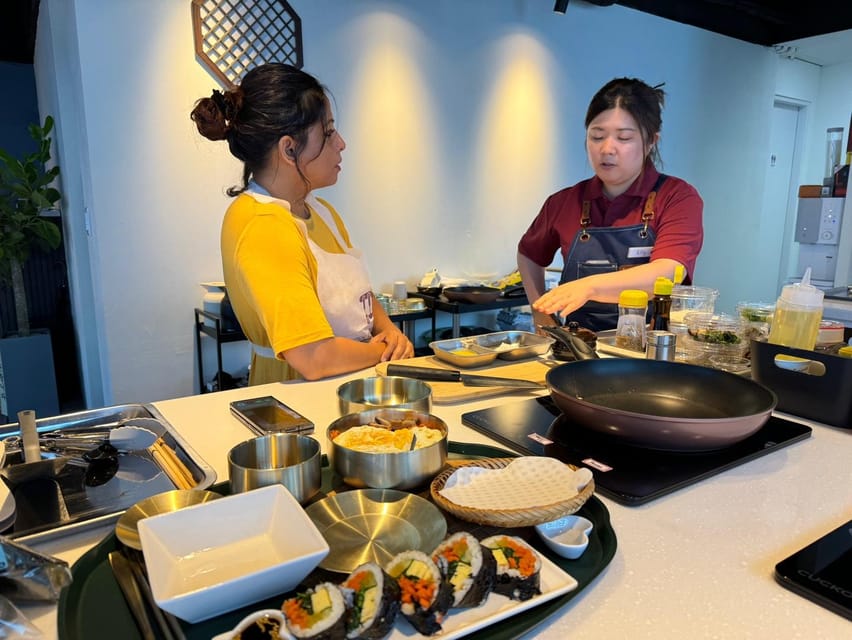 Seoul: Korean Cooking at Seoul Cooking Club! - Making the main dishes: japchae, bulgogi, and bibimbap