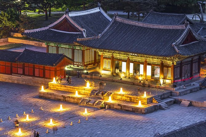 Seoul Night Tour (Gwangjang Market, Royal Palace and Naksan Park) - Cheonggyecheon Stream sets the evening mood